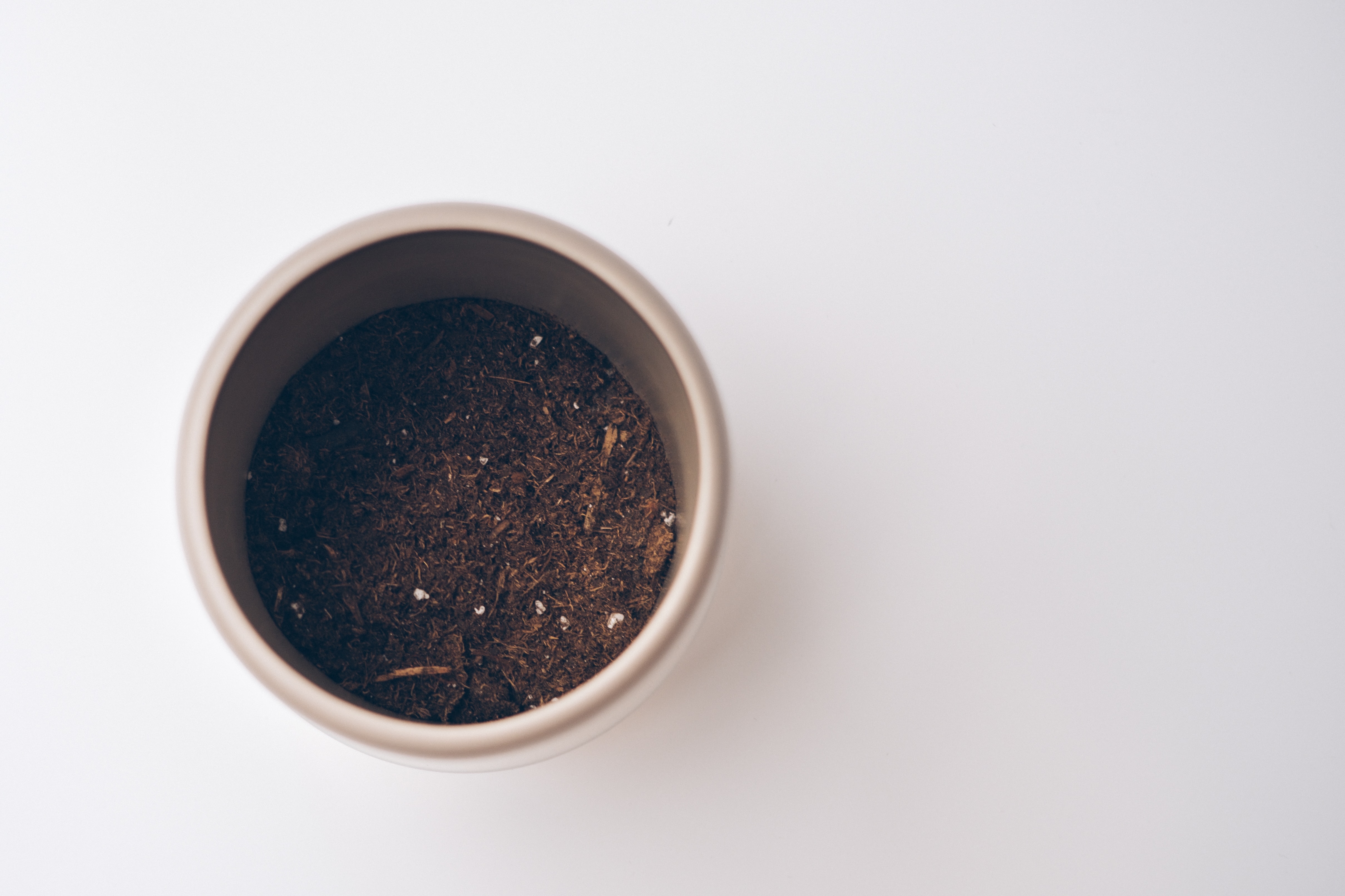 Top down shot of the vase showing dirt inside