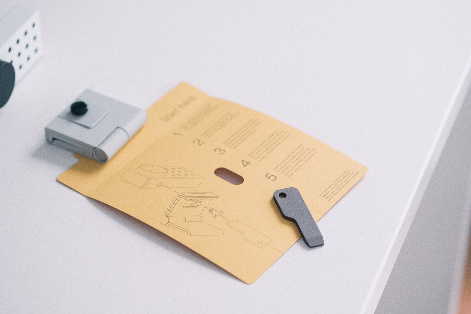 opal c1 mount on yellow instructions, with a custom screwdriver.