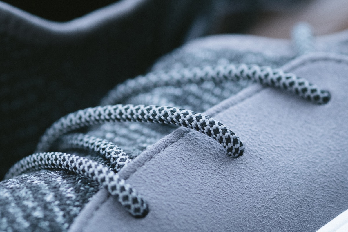 Closeup of detail including shoelaces on vessi shoe