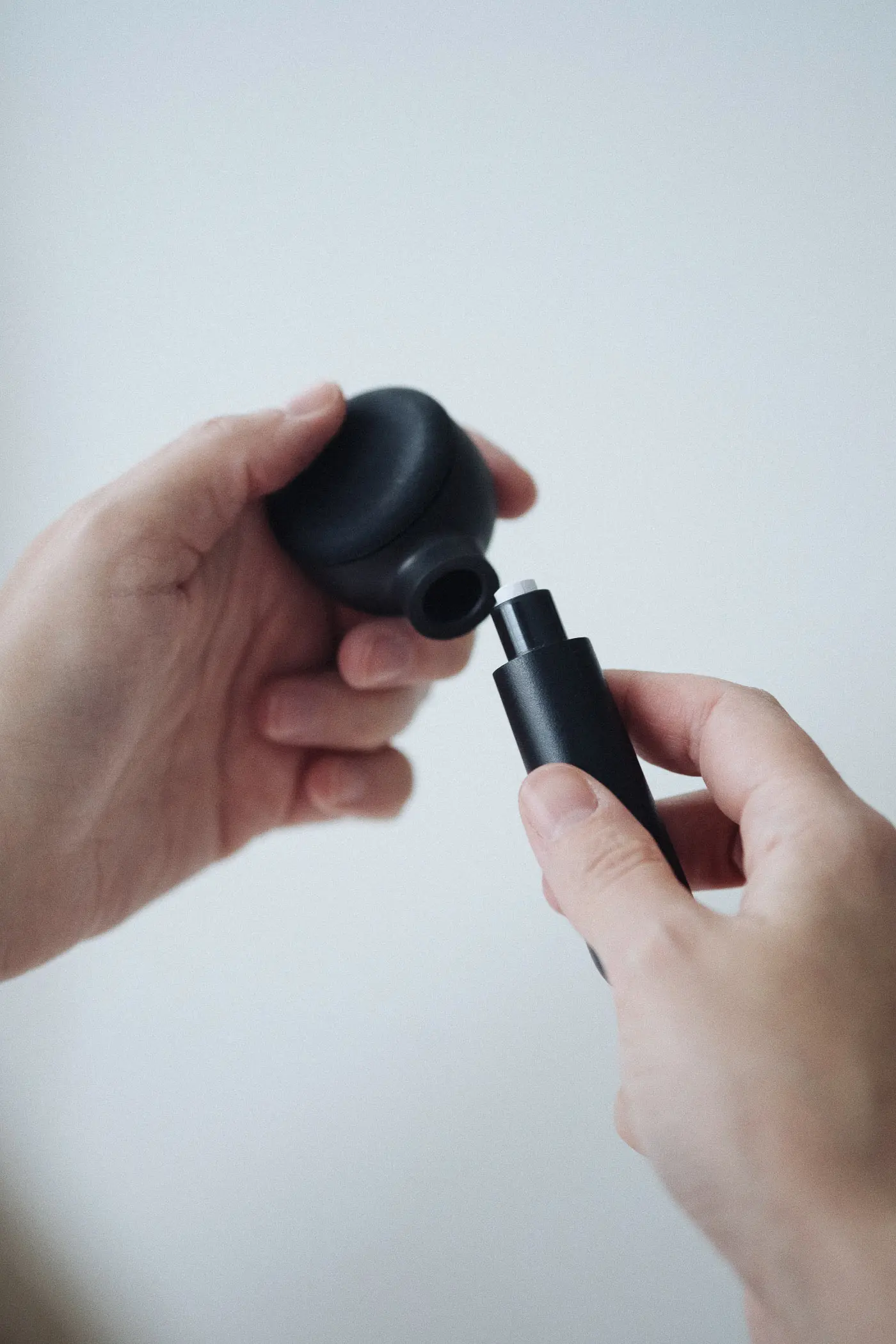 woman taking off bowl on handpipe
