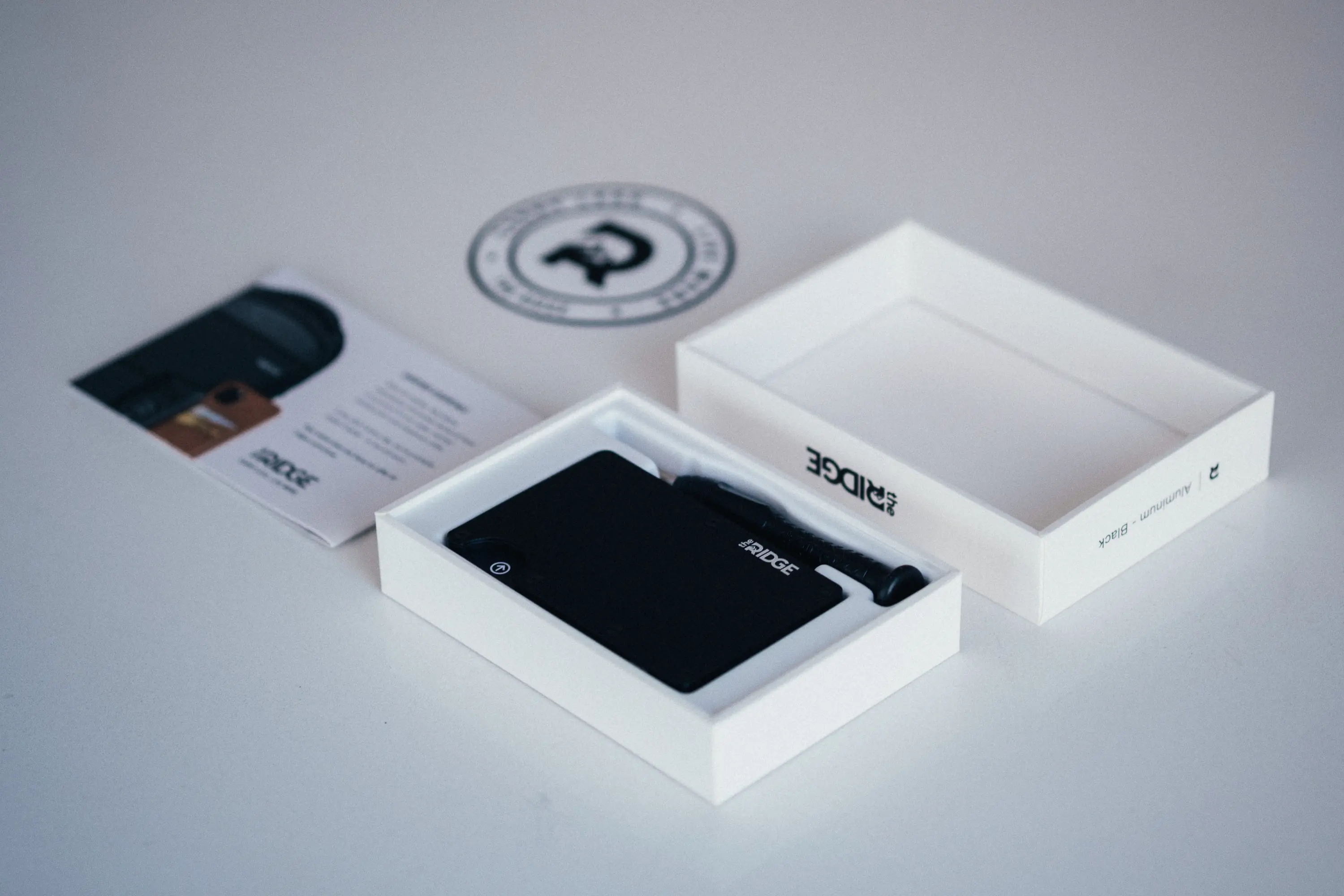 Ridge wallet box open on counter showing packaging