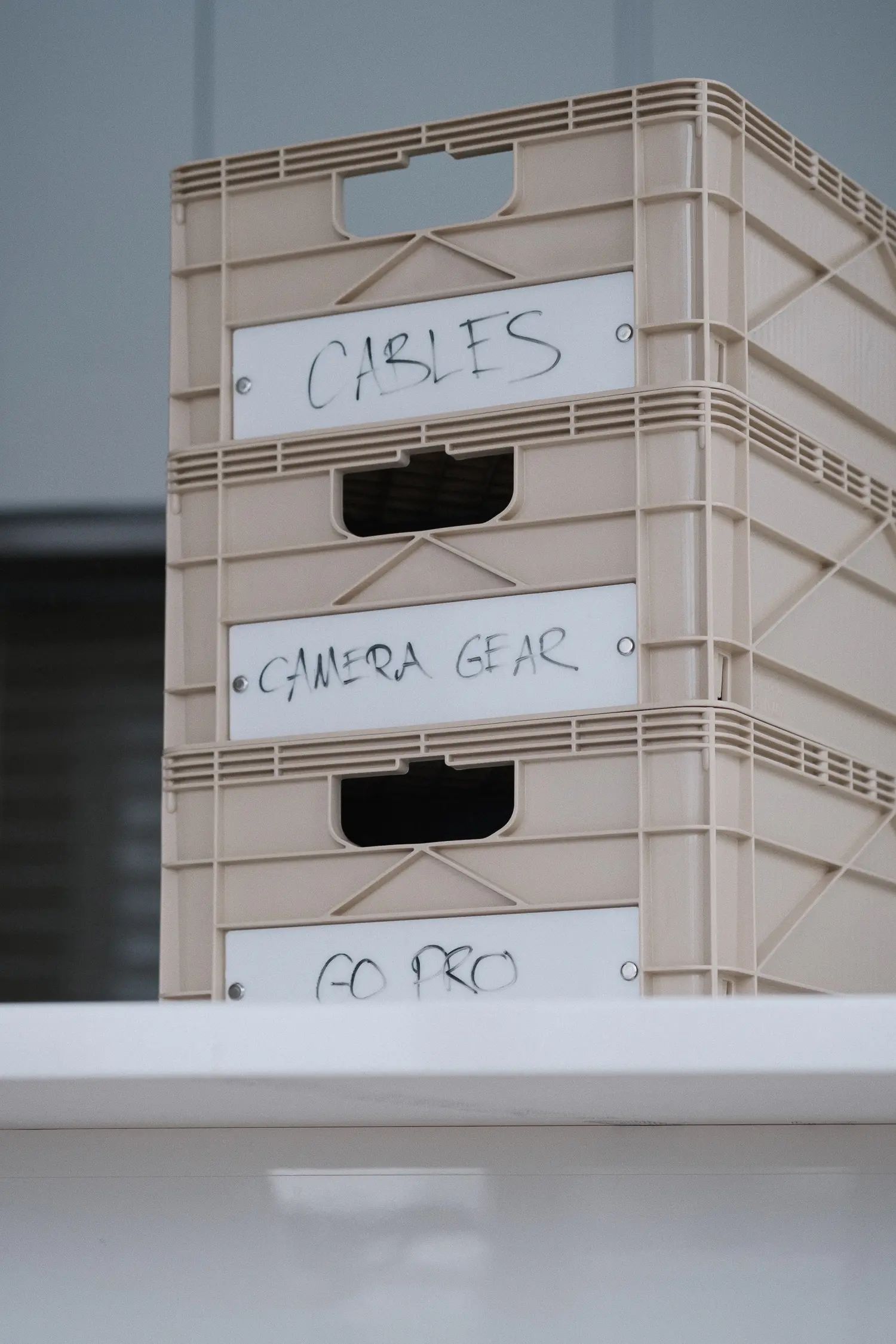 sidio storage crates with white labels on each