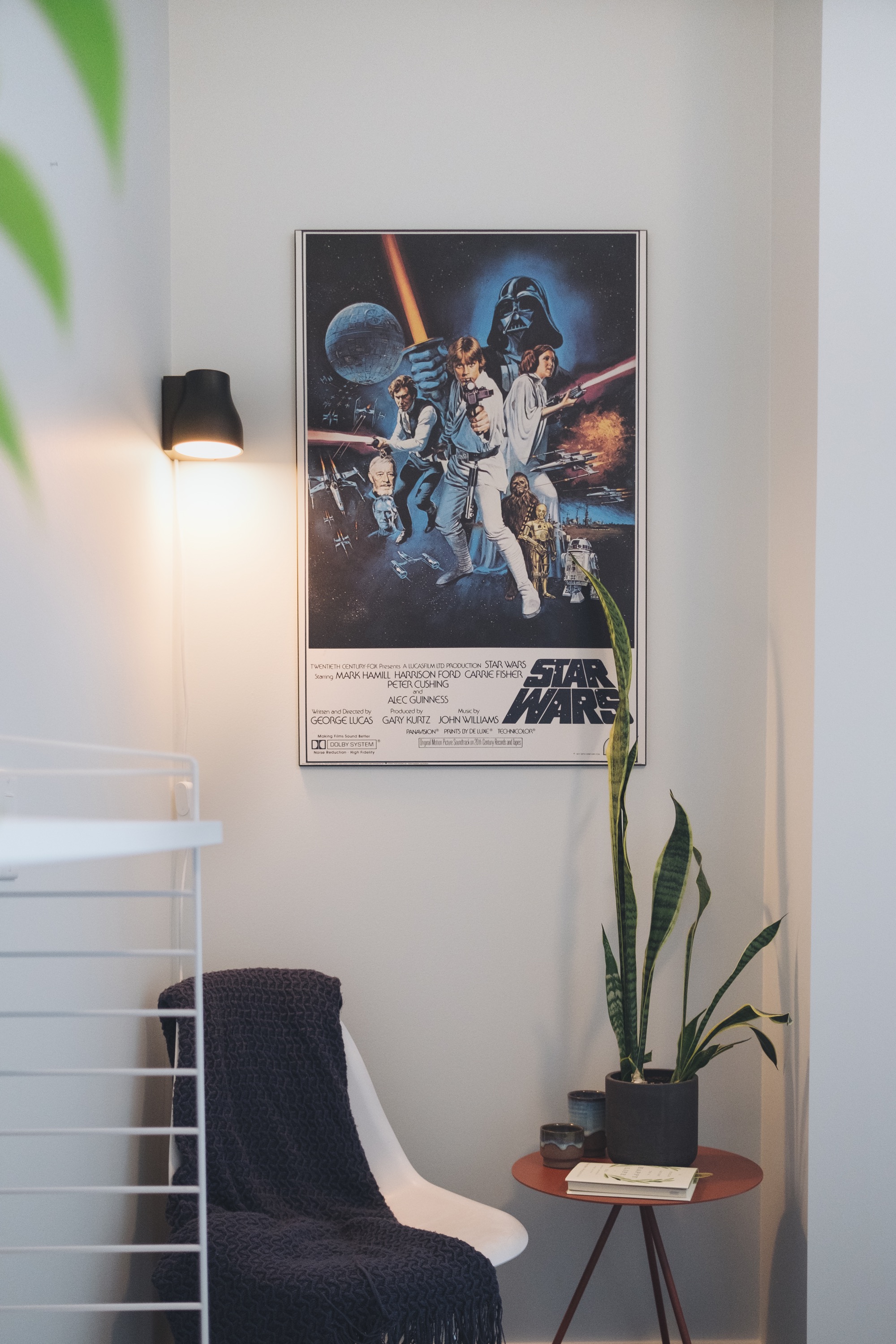 Lamp in office with poster and plants