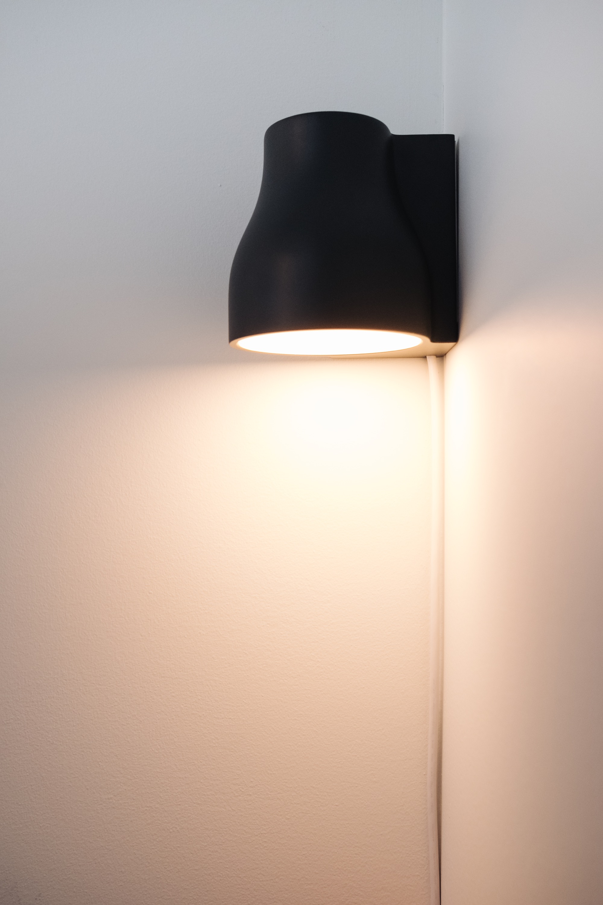 Lamp in corner with light on